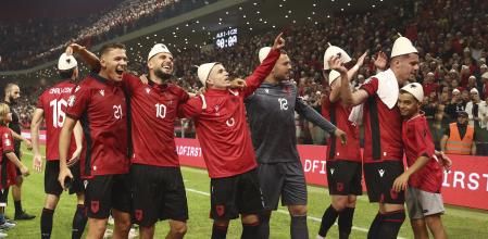 Albania players celebrate their victory at the Euro 2024 group E qualifying soccer match between Albania and Czech Republic at Air Albania stadium in Tirana, Albania, Thursday, Oct. 12, 2023. (AP Photo/Franc Zhurda)