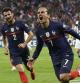 France's Antoine Griezman celebrates after scoring his side's first goal during the World Cup 2022 group D qualifying soccer match between France and Finland at Decines stadium in Lyon, France, Tuesday Sept. 7, 2021. (AP Photo/Laurent Cirpiani)