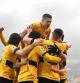 WOLVERHAMPTON, ENGLAND - DECEMBER 19: Daniel Podence of Wolverhampton Wanderers (hidden) celebrates with teammates after scoring a goal which is later disallowed by VAR due to an offside during the Premier League match between Wolverhampton Wanderers and Chelsea at Molineux on December 19, 2021 in Wolverhampton, England. (Photo by Clive Mason/Getty Images)