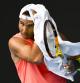 Rafa Nadal está inédito este 2023 desde el Open de Australia (en la imagen secándose el sudor con una toalla en Melbourne)