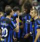 Inter Milan's Yann Aurel Bisseck, centre right, celebrates with teammates after scoring the opening goal during the Serie A soccer match between Inter Milan and Lecce at the San Siro stadium in Milan, Italy, Saturday, Dec. 23, 2023. (AP Photo/Luca Bruno)