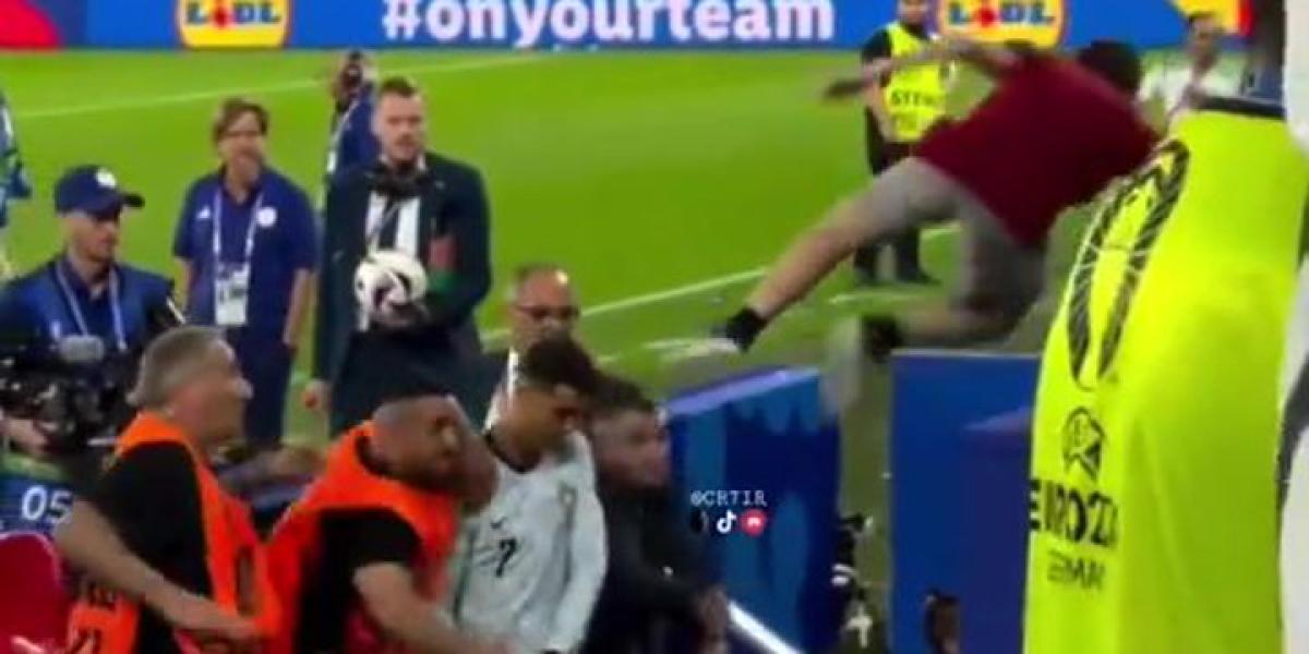 La última locura por tocar a Cristiano: ¡salto kamikaze y caída al foso!