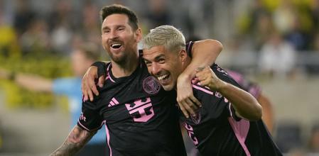 COLUMBUS, OHIO - OCTOBER 02: Lionel Messi #10 and Luis Suarez #9 of Inter Miami CF celebrate a goal during the second half against the Columbus Crew at Lower.com Field on October 02, 2024 in Columbus, Ohio. (Photo by Jason Mowry/Getty Images