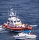 SIRACUSA, ITALY - AUGUST 15: Controls to the boats from the Coast Guard at sea in an aerial view from the helicopter of the Coast Guard in the day of Ferragosto in the within of the operation 